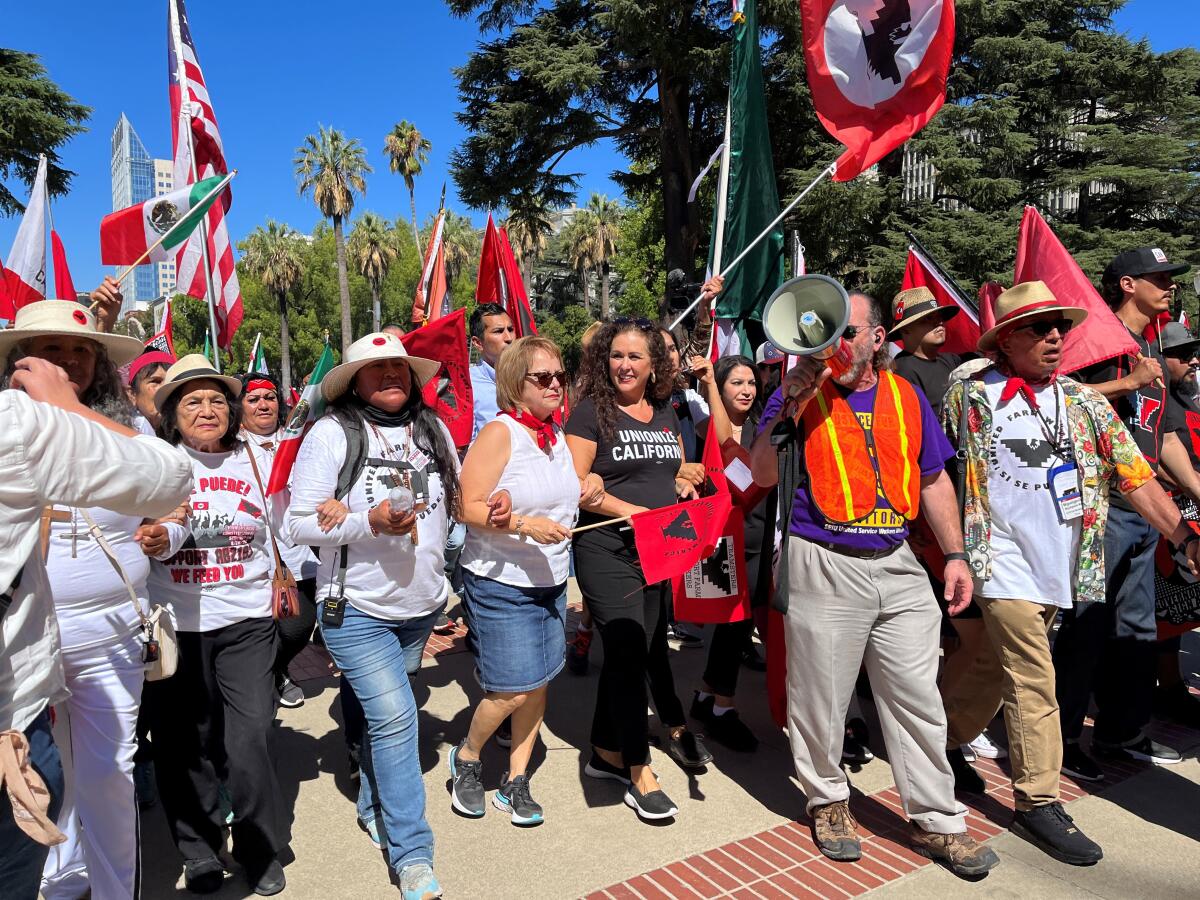 Members and supporters of the United Farm Workers arrive at the state Capitol in Sacramento Friday.