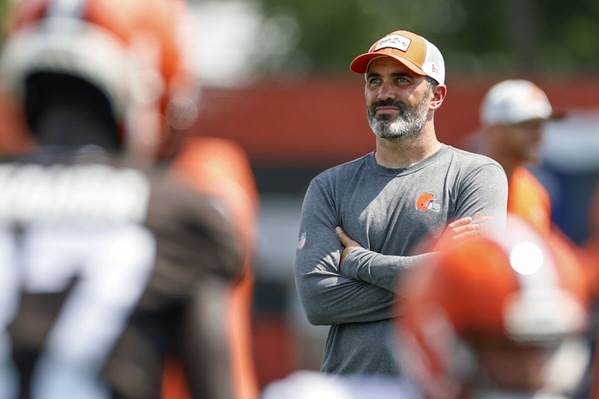 Cleveland Browns head coach Kevin Stefanski watches drills during an NFL football practice Thursday, Aug. 12, 2021, in Berea, Ohio. (AP Photo/Ron Schwane)