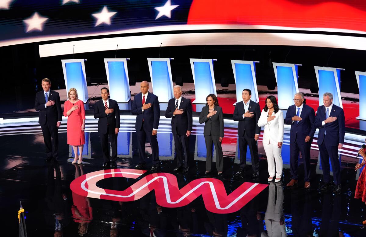 Ten Democratic presidential candidates take the stage before they debate in Detroit on July 31.