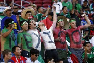 Fans cheer for their team before a recent match between Mexico and Chile at Levi's Stadium in Santa Clara.