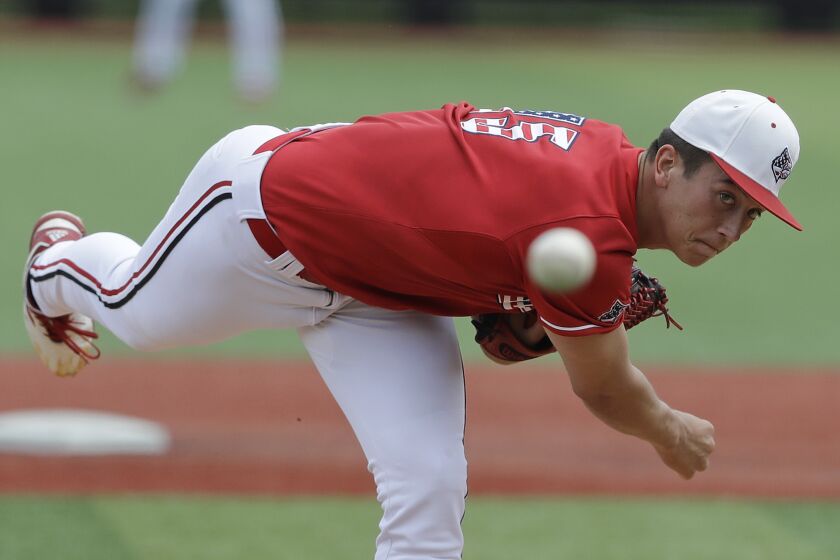 FILE - In this June 8, 2019, file photo, Louisville's Bobby Miller throws during the first inning against East Carolina in Game 2 at the NCAA college baseball super regional in Louisville, Ky. The Los Angeles Dodgers selected Miller in the baseball draft Wednesday, June 10, 2020. (AP Photo/Darron Cummings, File)