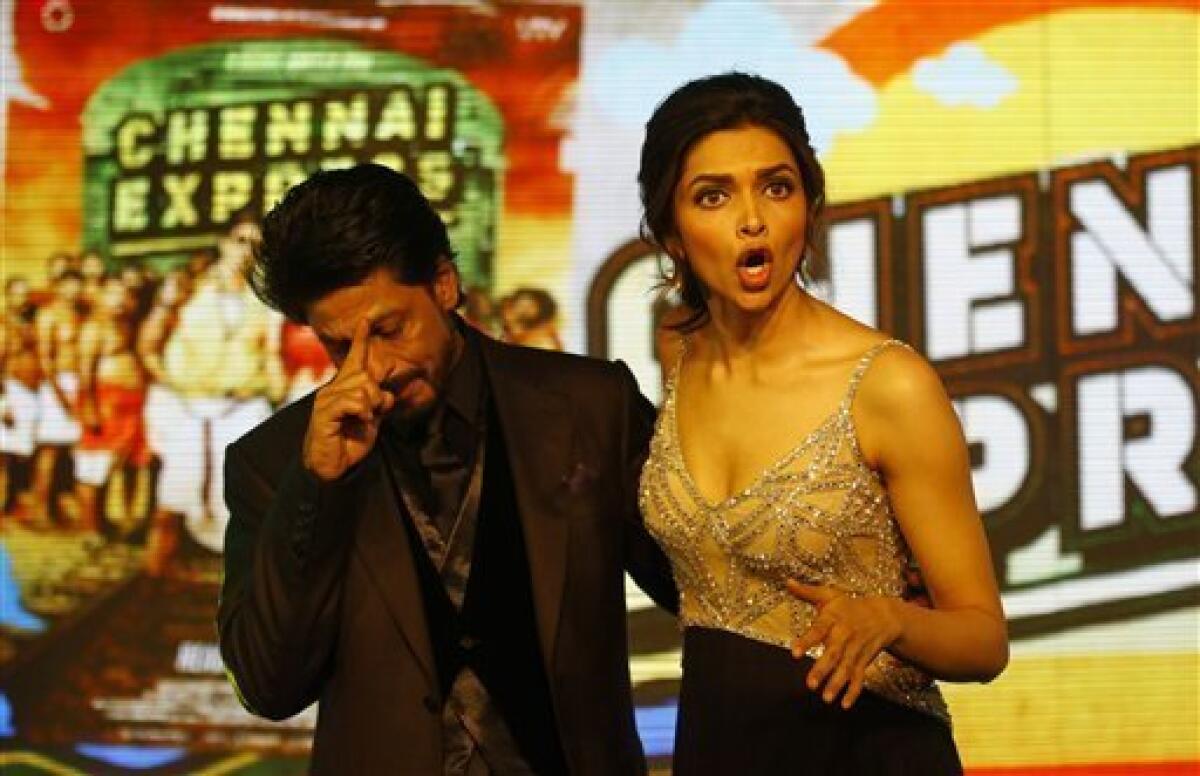 Bollywood actor Deepika Padukone reacts during a press conference