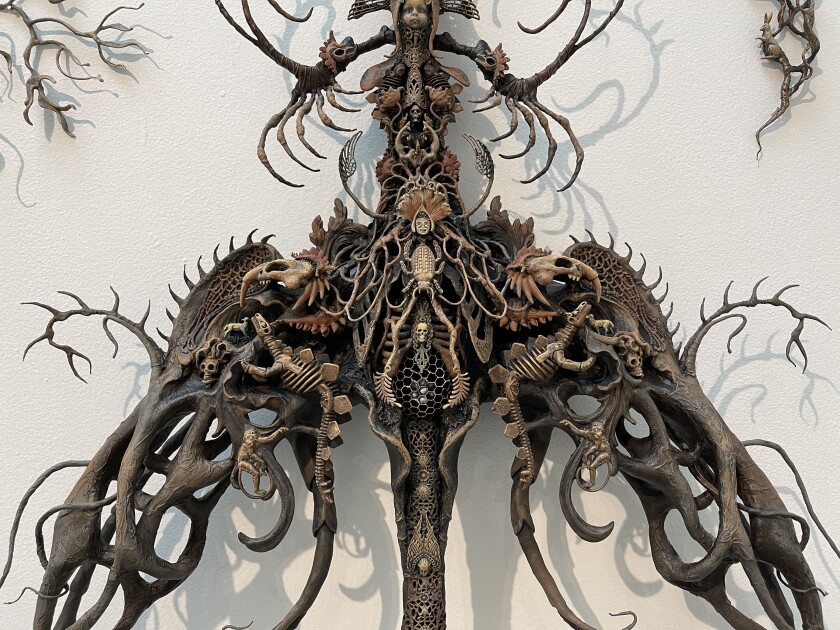 Laurie Hassold, "Fossils From the Future," wall installation, 2020-21, mixed media, 120 x 144 inches.
