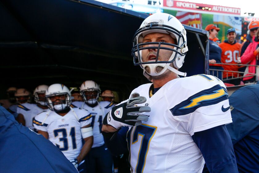 Chargers quarterback Philip Rivers stands in the tunnel before a game against the Broncos in Denver on Jan. 3.