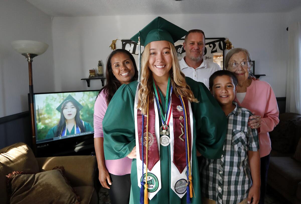 Jordan Galante watched Costa Mesa High's Class of 2020 graduation ceremony via TV broadcast with her family at her home.