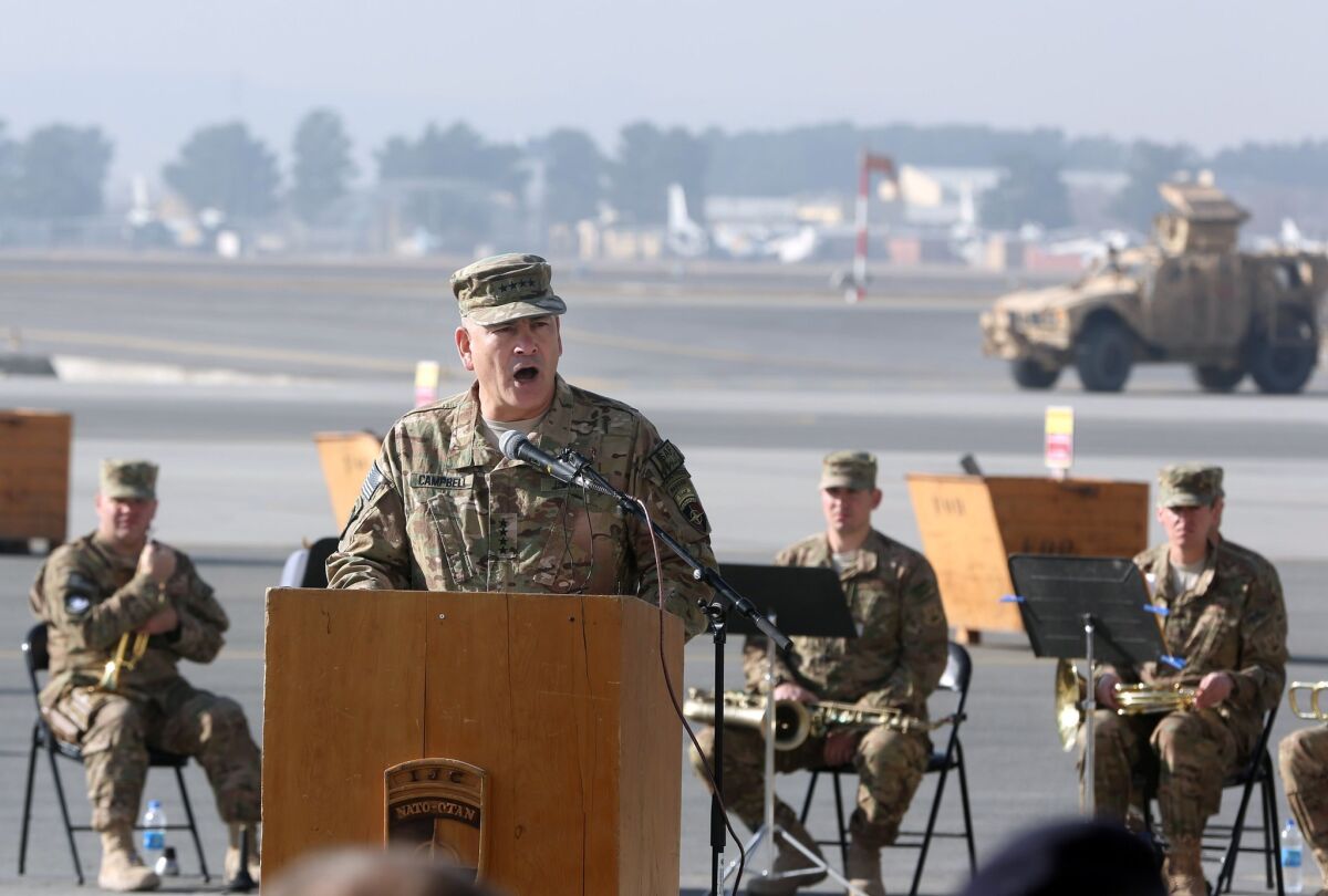 General John F. Campbell speaks during a flag-lowering ceremony in Kabul, Afghanistan.
