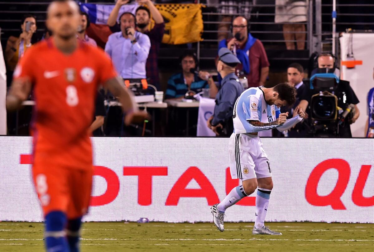 Argentina's Lionel Messi gestures after missing his shot during the penalty shootout against Chile during the Copa America final.