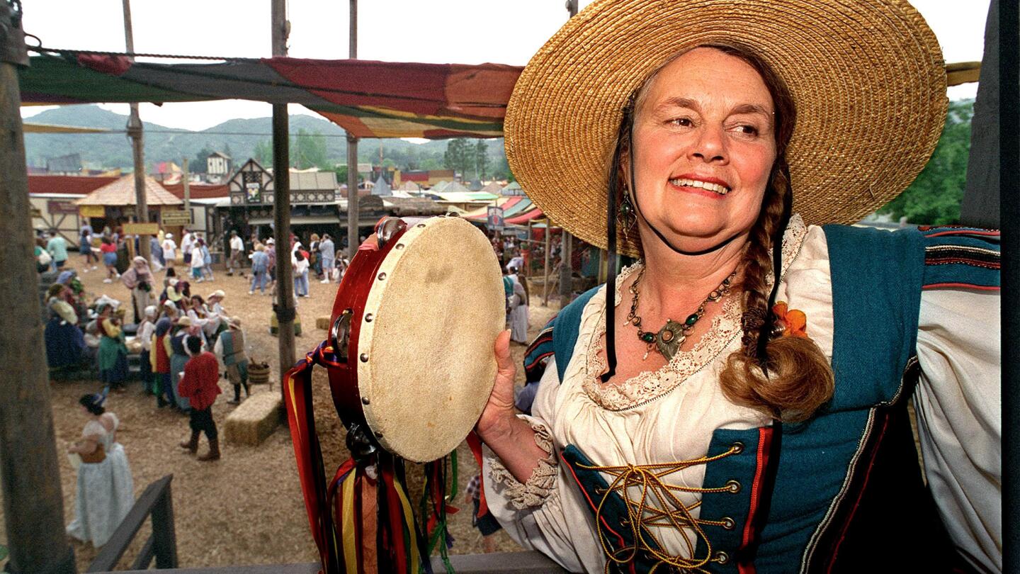Phyllis Patterson, president of the Renaissance Pleasure Faire, overlooks the Newgate Court at the 1999 event in Devore in San Bernardino County.