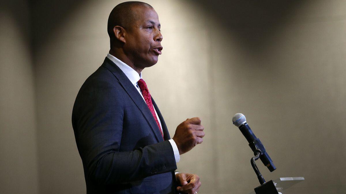 Maryland athletic director Damon Evans speaks at a news conference on Tuesday held to address the school's football program and the death of a player who collapsed on a practice field.