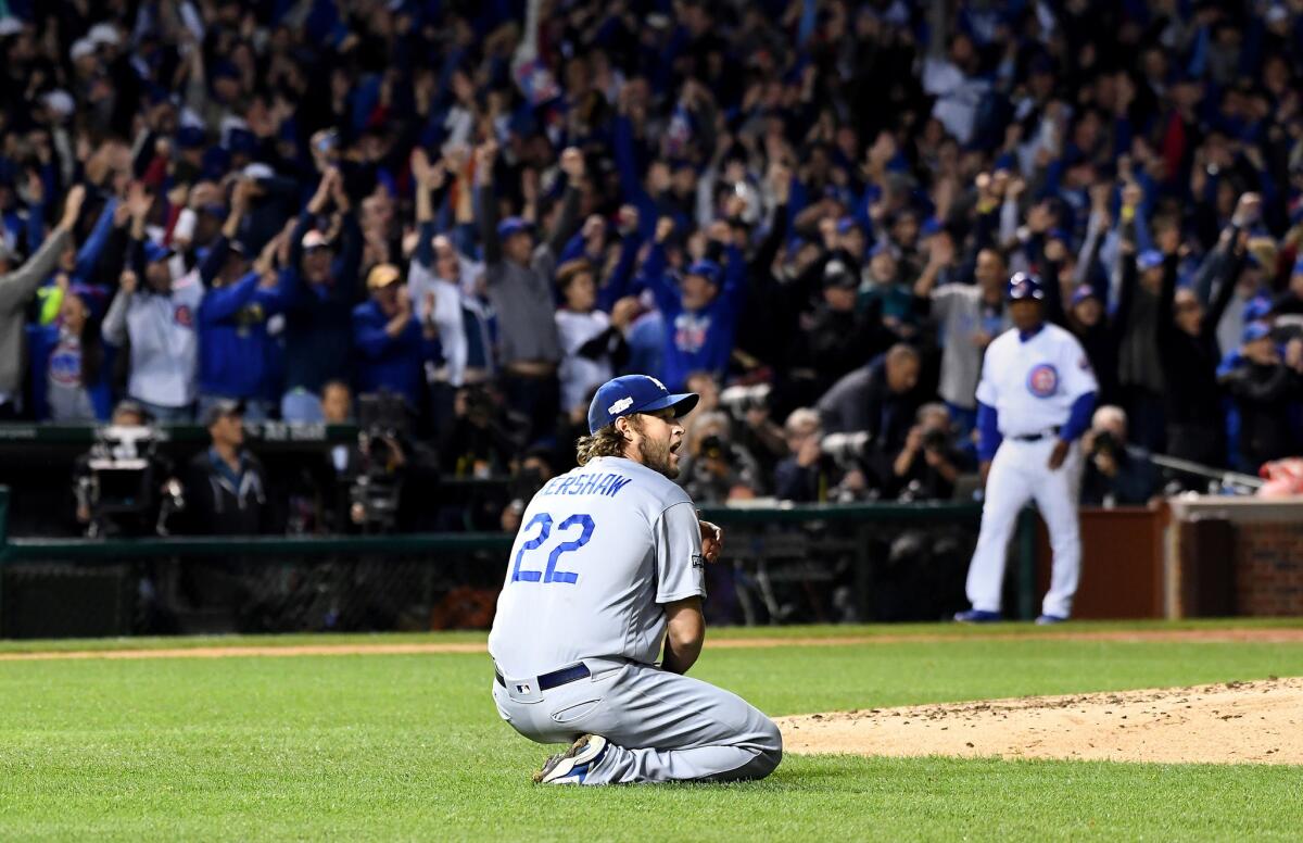 Dodgers pitcher Clayton Kershaw drops to the ground after giving up a home run to Chicago Cubs first baseman Anthony Rizzo in Game 6 of the National League Championship Series last year.