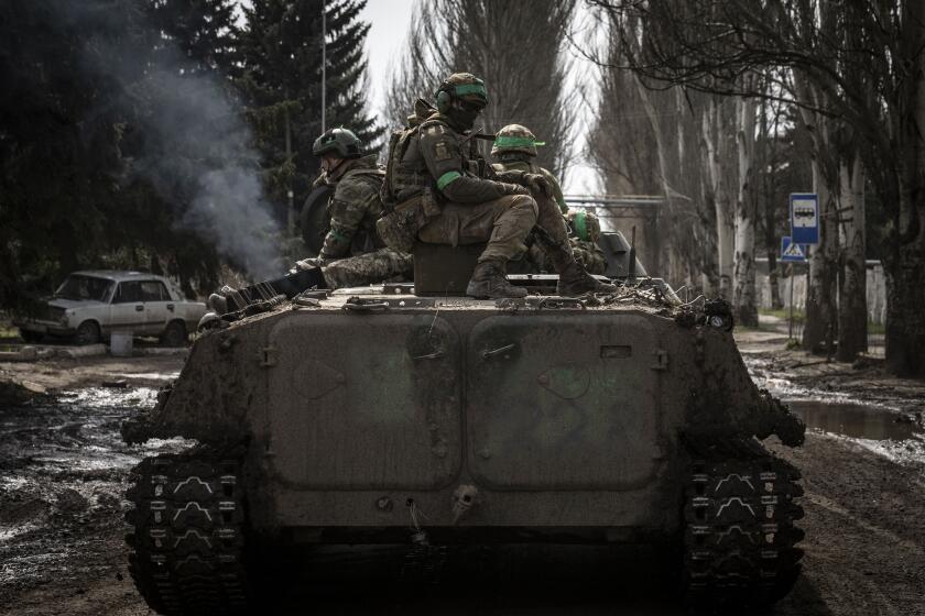 DONETSK OBLAST, UKRAINE - MARCH 29: Ukrainian soldiers are seen on a tank amid Russia-Ukraine war on the frontline of Donetsk Oblast, Ukraine on March 29, 2023. (Photo by Muhammed Enes Yildirim/Anadolu Agency via Getty Images)