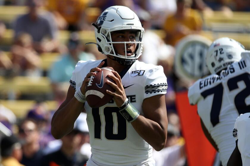 BATON ROUGE, LOUISIANA - OCTOBER 05: Quarterback Jordan Love #10 of the Utah State Aggies looks to throw a pass against the LSU Tigers at Tiger Stadium on October 05, 2019 in Baton Rouge, Louisiana. (Photo by Chris Graythen/Getty Images)