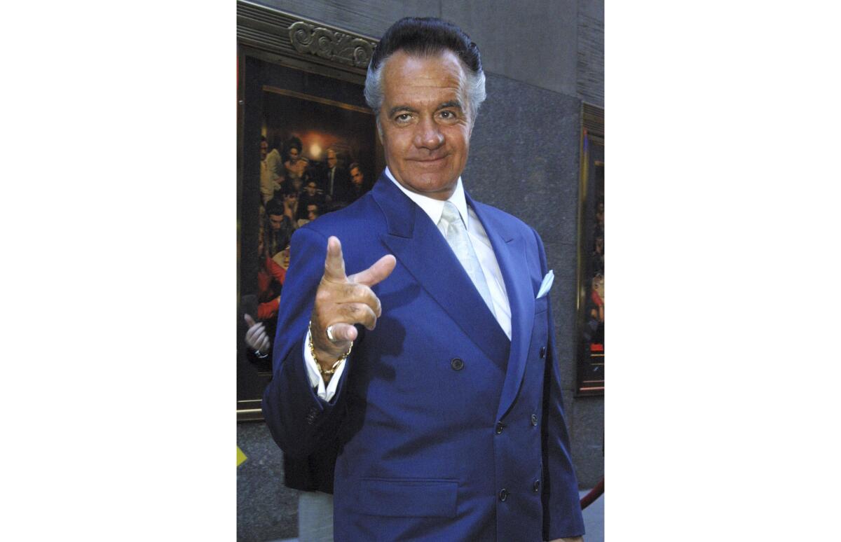 FILE - Tony Sirico who plays Paulie Walnuts on the HBO series "The Sopranos" arrives for the premiere of the show's fourth season in this Thursday, Sept. 5, 2002, at New York's Radio City Music Hall. Sirico, who played the impeccably groomed mobster Paulie Walnuts in “The Sopranos” and brought his tough-guy swagger to films including “Goodfellas,” died Friday, July 8, 2022. He was 79. (AP Photo/Tina Fineberg, File)