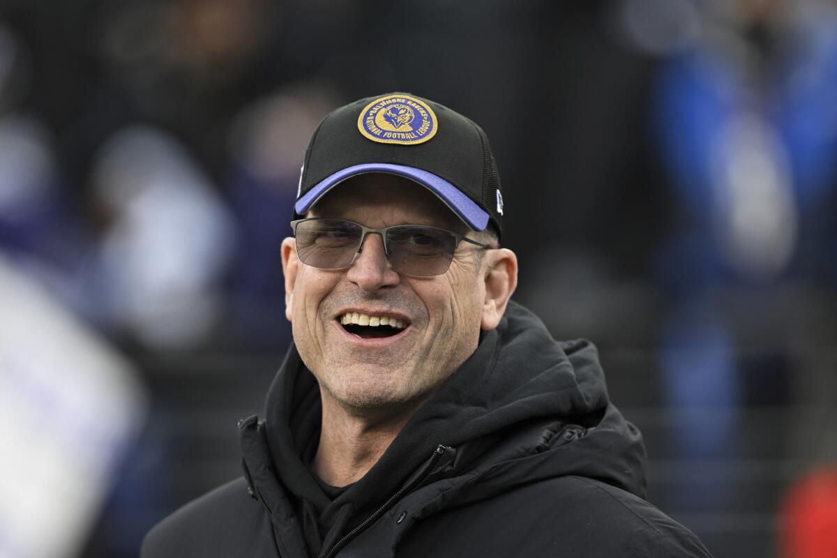  Jim Harbaugh looks on before the NFL divisional round playoff game between the Ravens and the Texans. 