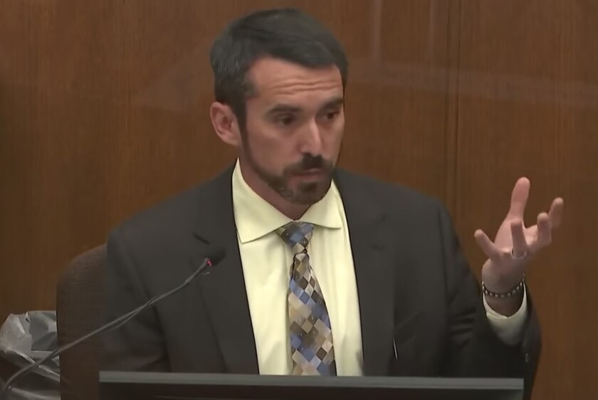 In this screen grab from video, Seth Stoughton, associate law professor at the University of South Carolina, testifies as Hennepin County Judge Regina Chu presides over court Wednesday, Dec. 15, 2021, in the trial of former Brooklyn Center police Officer Kim Potter in the April 11, 2021, death of Daunte Wright, at the Hennepin County Courthouse in Minneapolis, Minn. (Court TV via AP, Pool)