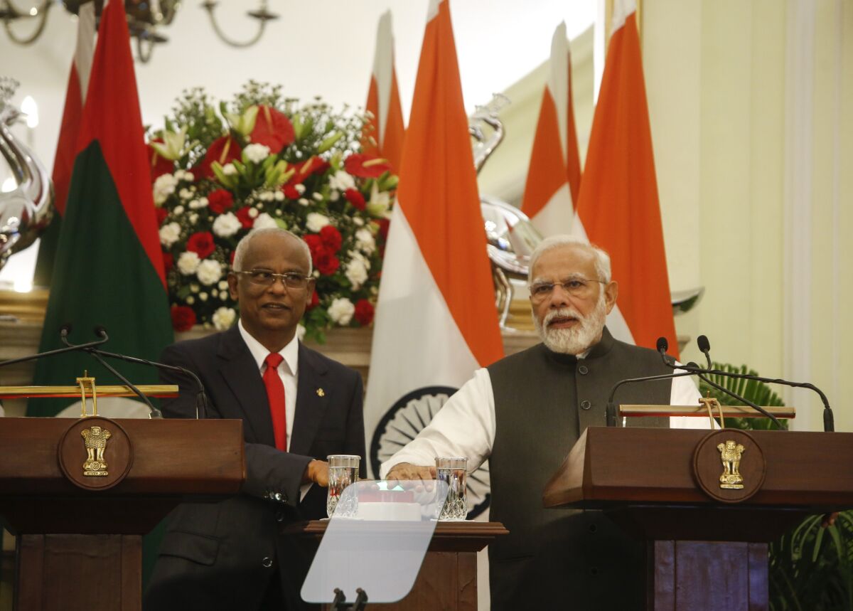 Maldives President Ibrahim Mohamed Solih, left and Indian Prime Minister Narendra Modi jointly launch connectivity projects in Maldives during their meeting in New Delhi, India, Tuesday, Aug.2, 2022. The Greater Male Connectivity Project, a 6.74 kilometers long bridge and causeway link funded by India will connect the nation's capital, Male, to three other islands. (AP Photo)