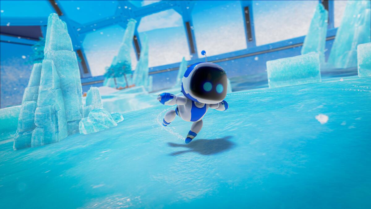 A screen shot of "Astro's Playroom" with the title robot exploring an icy environment.