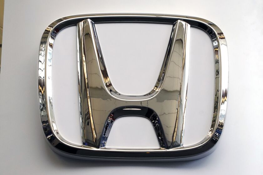 FILE- This Feb. 14, 2019 file photo shows a Honda logo at the 2019 Pittsburgh International Auto Show in Pittsburgh. Honda is recalling a half-million vehicles in the U.S. and Canada, Wednesday, March 15, 2023, because the front seat belts may not latch properly. The recall covers some of the the automaker’s top-selling models including the 2017 through 2020 CR-V, the 2018 and 2019 Accord, the 2018 through 2020 Odyssey and the 2019 Insight. Also included is the Acura RDX from the 2019 and 2020 model years. (AP Photo/Gene J. Puskar, File)