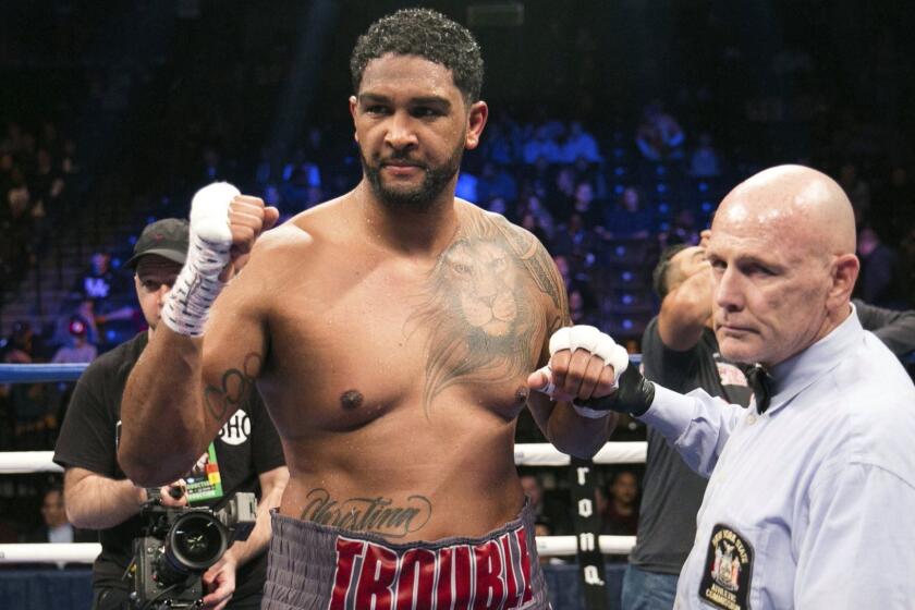 FILE - In this Nov. 4, 2017, file photo, Dominic Breazeale celebrates after defeating Eric Molina in a heavyweight boxing match in New York. Wilder is slated to defend his title May 18, 2019, at Barclays Center in New York, against mandatory challenger Dominic Breazeale. (AP Photo/Kevin Hagen, File)