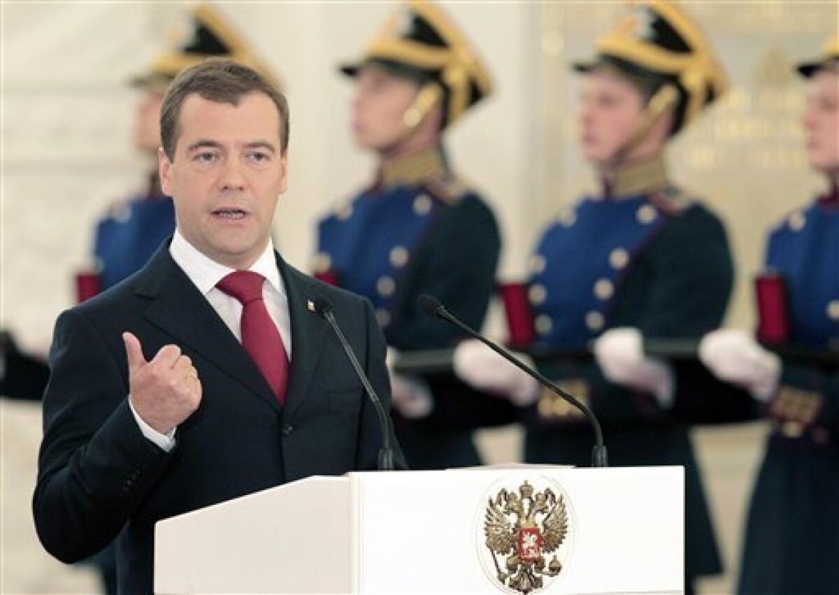 Russia's President Dmitry Medvedev speaks in the Moscow Kremlin, on Saturday, June 12, 2010, during an award ceremony to mark the Day of Russia. Kyrgyzstan on Saturday asked Russia to send troops to end ethnic violence in the impoverished nation that hosts U.S. and Russian military bases. There was no immediate response from Moscow to Otunbayeva's plea for help. (AP Photo/Alexander Natruskin, Pool)