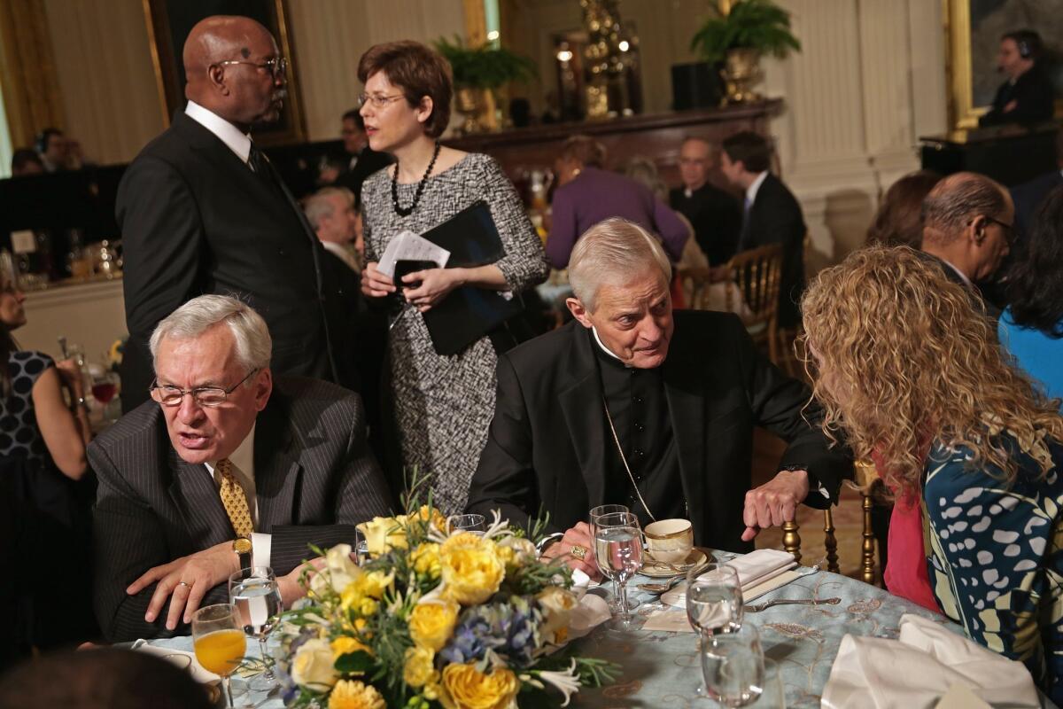 Catholic Archbishop of Washington Donald Wuerl joins other Christian leaders during an Easter prayer breakfast at the White House last month. Although such public expressions of religion remain a feature of American life, the nation's Christian population has declined, a new study shows.