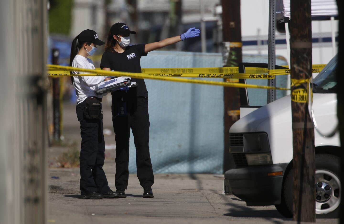 Three boys found fatally stabbed in South L.A. were brothers