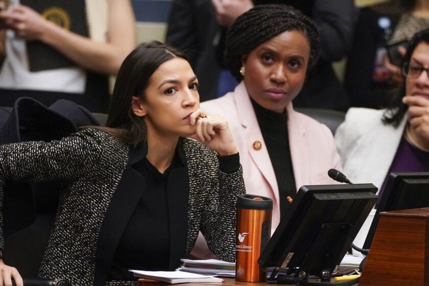 House Oversight and Reform Committee members, from left, Rep. Alexandria Ocasio-Cortez, D-N.Y., Rep. Ayanna Pressley, D-Mass., and Rep. Rashida Tlaib, D-Mich., listen during a committee hearing on Capitol Hill in Washington, Tuesday, Feb. 26, 2019. The committee voted to subpoena Trump administration officials over family separations at the southern border, the first issued in the new Congress as Democrats have promised to hold the administration aggressively to count. The decision by the Oversight Committee will compel the heads of Justice, Homeland Security and Health and Human Services to deliver documents. (AP Photo/J. Scott Applewhite)