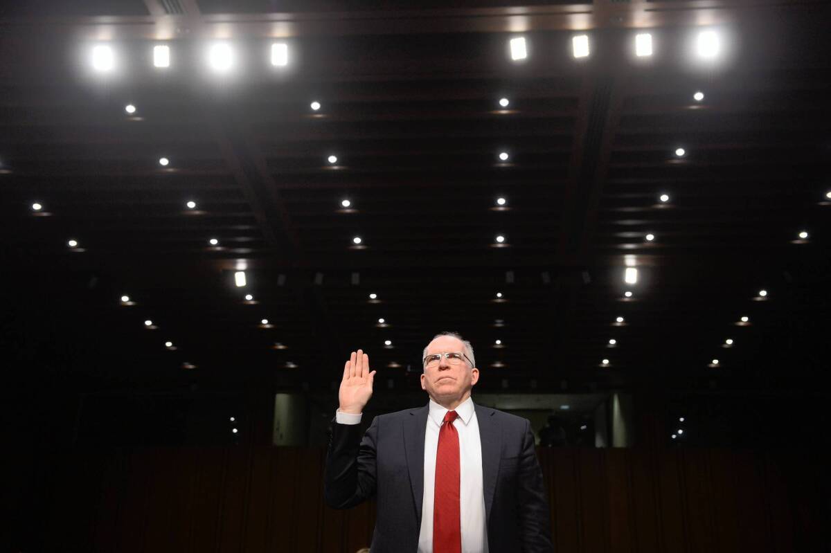 John Brennan is sworn in to testify Feb. 7 at his confirmation hearing before the Senate Intelligence Committee. The Senate has confirmed him as CIA director by a 63-34 vote.