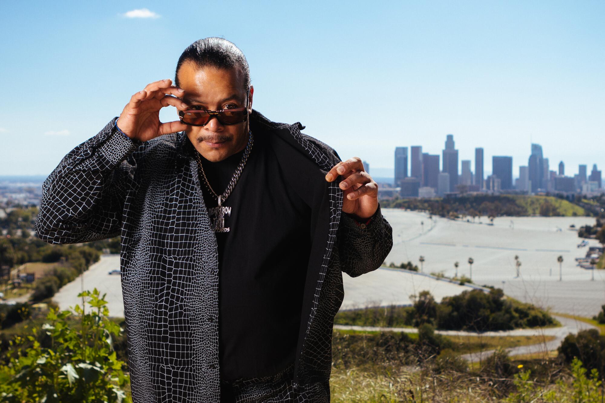 Suga Free photographed in front of downtown L.A.