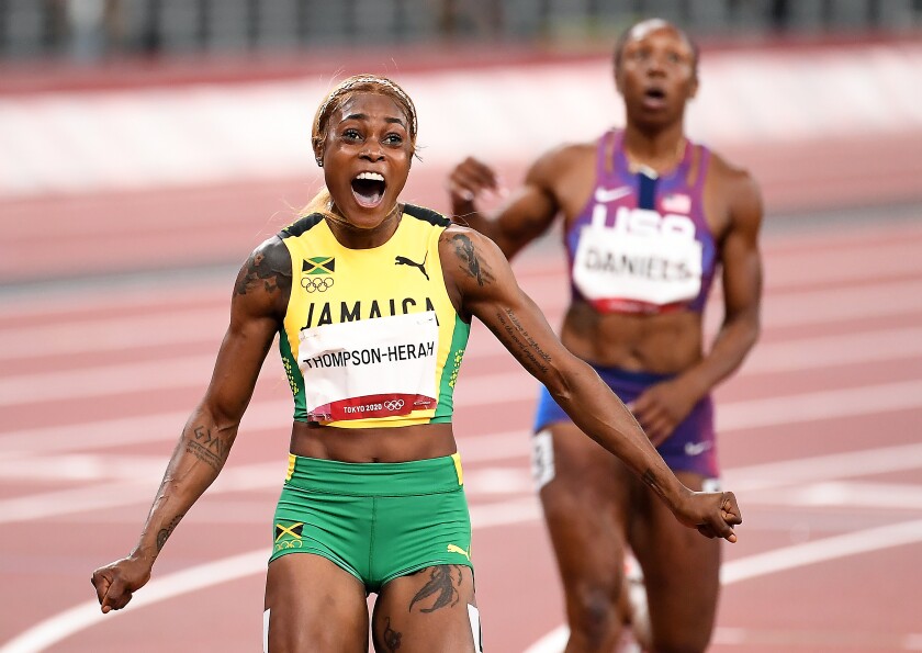 Jamaica's Elaine Thompson-Herah celebrates 