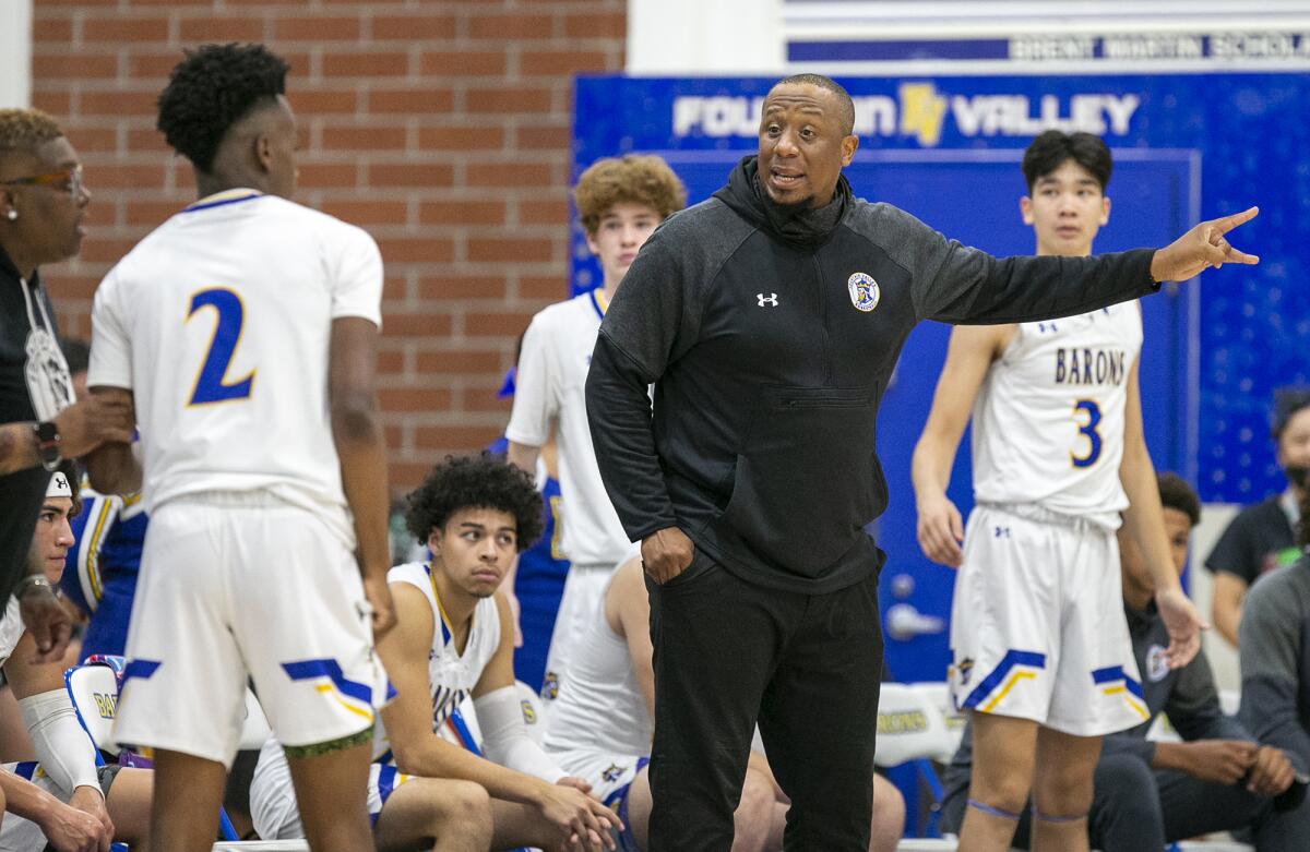 Fountain Valley's D'Cean Bryant, who celebrated his birthday Wednesday, gives instructions to his team.