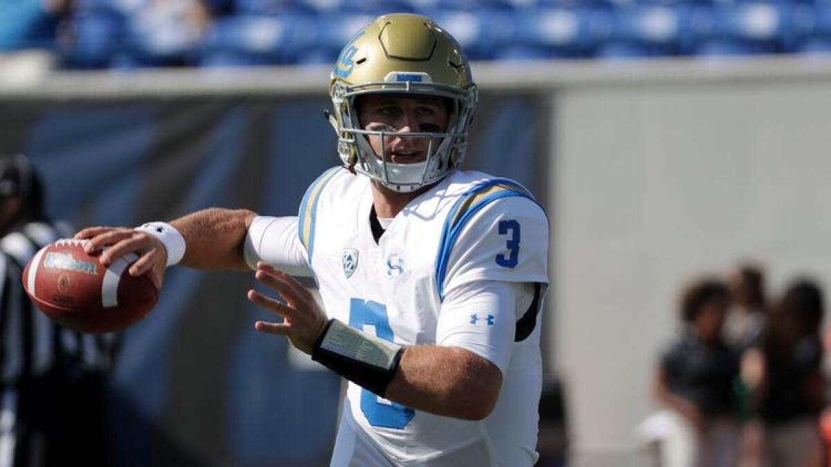 UCLA quarterback Josh Rosen warms up before playing against Memphis on Sept. 16.
