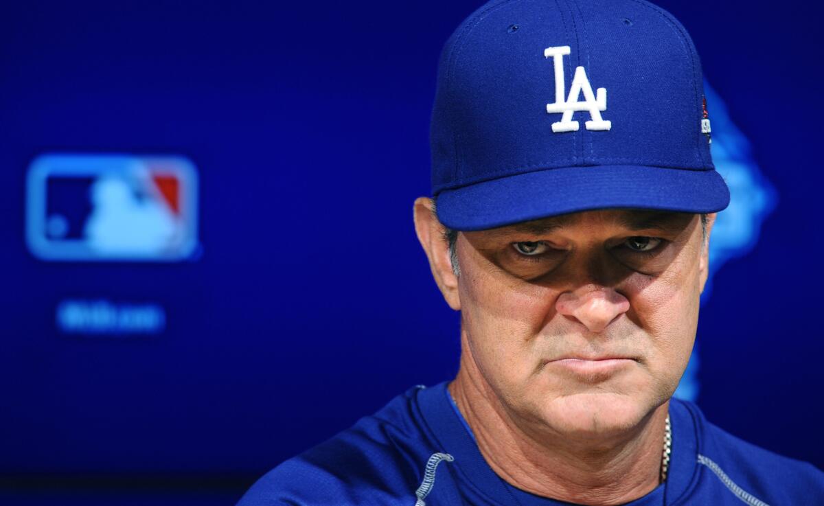 Dodgers Manager Don Mattingly answers questions during a new conference before his team's National League division series matchup with the New York Mets.