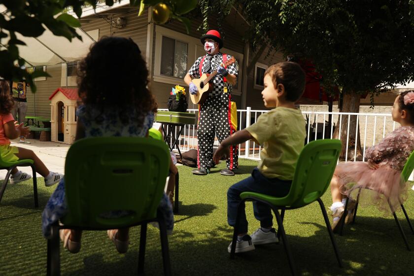 GLENDALE-CA-JUNE 1, 2020: Guilford Adams performs a show for children at a preschool in Glendale on Monday, June 1, 2020. (Christina House / Los Angeles Times)