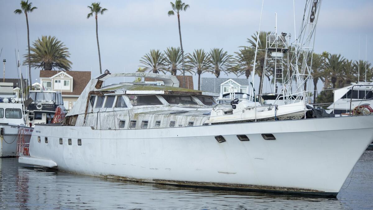 Energy Tech, an impounded 77-foot motor yacht, sits in Newport Harbor on Tuesday, when it was put up for auction by the city of Newport Beach.