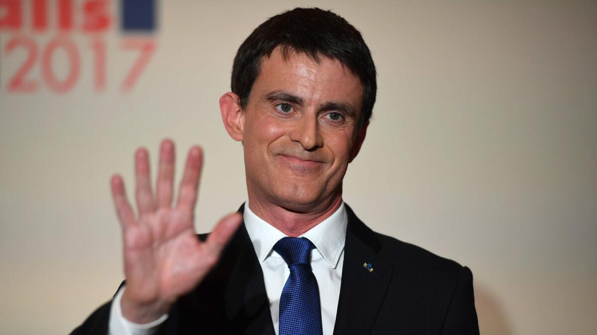 Defeated Socialist Party candidate Manuel Valls greets supporters after delivering a speech in Paris on Jan. 29, 2017.