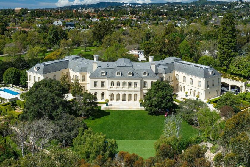 In 56,500 square feet, the "W"-shaped mansion has 123 rooms, including 14 bedrooms and 27 bathrooms.