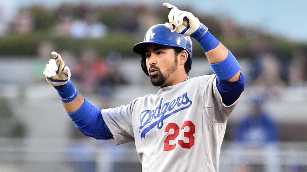 Dodgers first baseman Adrian Gonzalez celebrates after hitting a double against the San Diego Padres in June.