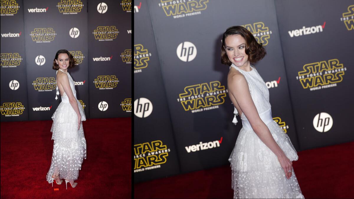 Daisy Ridley, one of the new stars of the franchise, walks the red carpet for the premiere of "Star Wars: The Force Awakens."