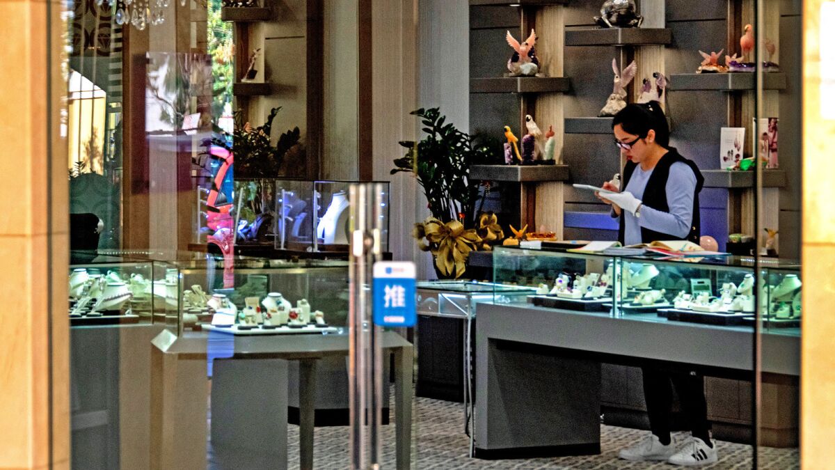 Busloads of Chinese tourists used to visit . luxury stores. Not anymore  - Los Angeles Times