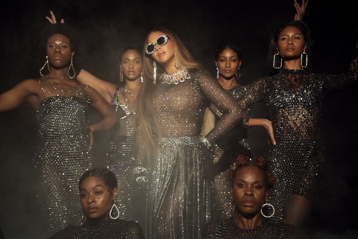 Beyoncé and backup dancers striking a pose in "Black Is King"