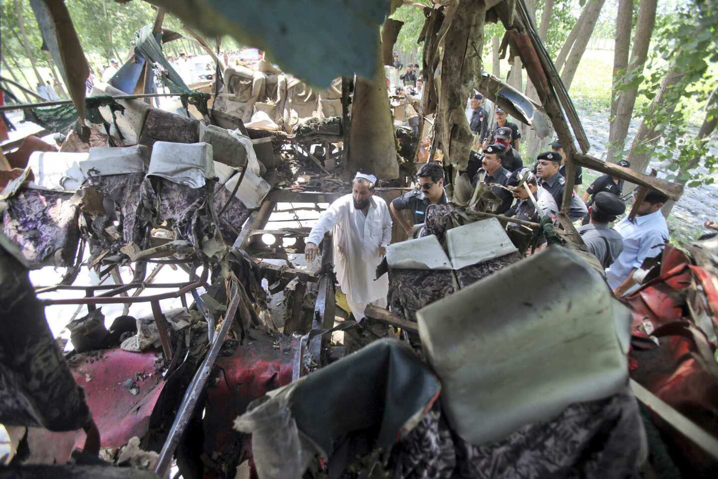 Bomb attack on bus kills at least 19 in Pakistan