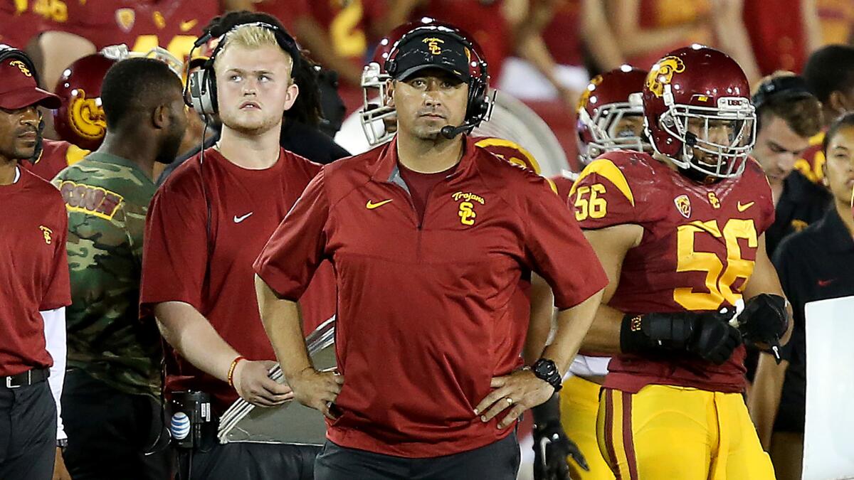 USC Coach Steve Sarkisian looks on during the team's 38-34 loss to Arizona State on Saturday.
