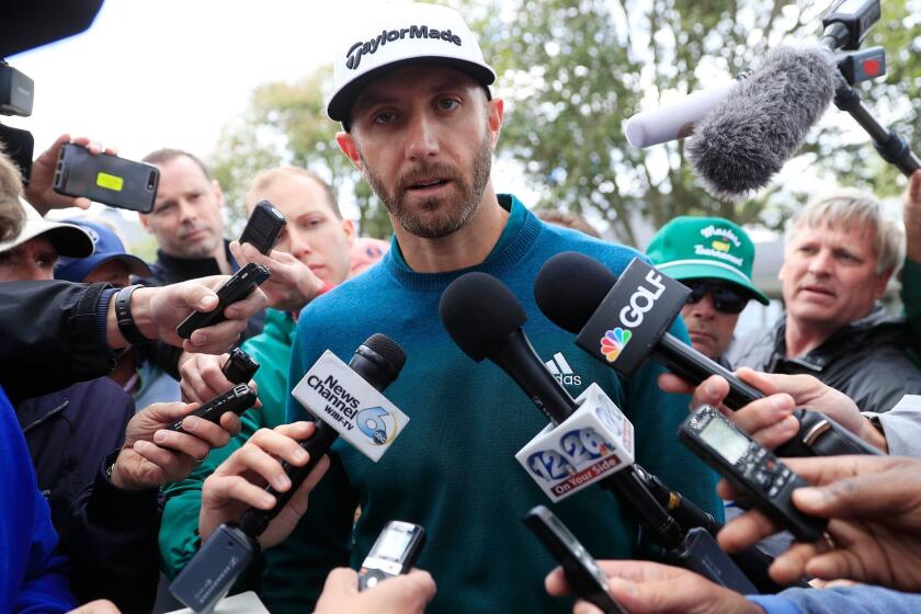 epa05892936 Dustin Johnson of the US speaks with the media outside the clubhouse after withdrawing from the Masters due to injury just as he reached his tee time for the first round of the 2017 Masters Tournament at the Augusta National Golf Club in Augusta, Georgia, USA, 06 April 2017. The Masters Tournament is held 06 April through 09 April 2017. EPA/TANNEN MAURY ** Usable by LA, CT and MoD ONLY **