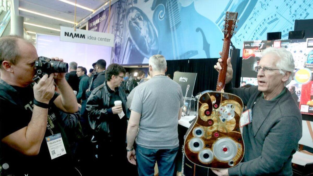 Convention goers check out exhibits at the 2017 NAMM Show at the Anaheim Convention Center.