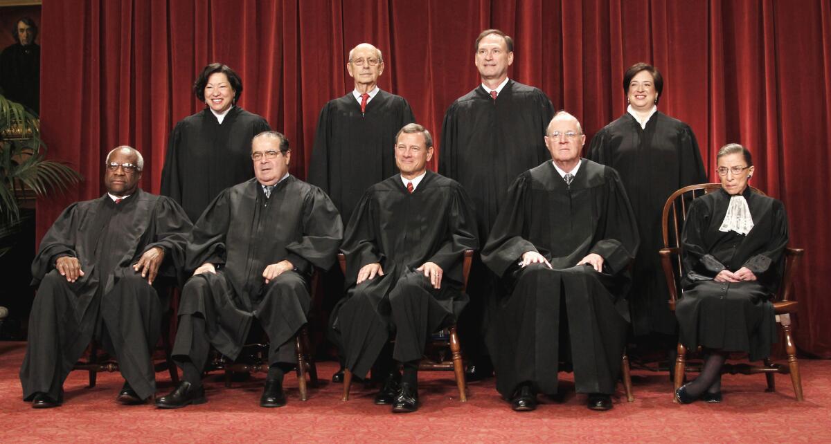 The justices of the U.S. Supreme Court gather for a group portrait in 2010. Seated from left are Associate Justices Clarence Thomas and Antonin Scalia, Chief Justice John G. Roberts Jr., Associate Justices Anthony M. Kennedy and Ruth Bader Ginsburg. Standing from left are Associate Justices Sonia Sotomayor, Stephen Breyer, Samuel A. Alito Jr. and Elena Kagan.