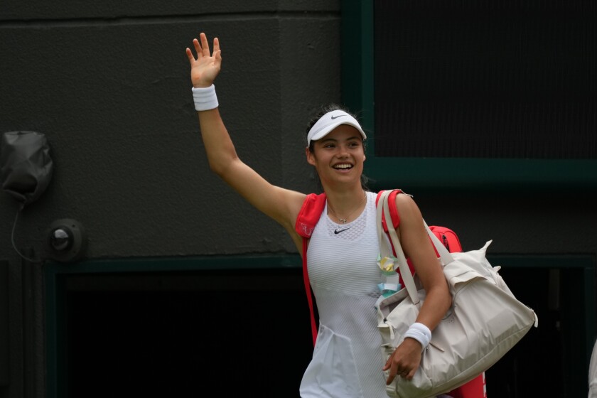 Emma Raducanu, 18, acknowledges the crowd after she beat Romania's Sorana Cirstea at Wimbledon on July 3, 2021.
