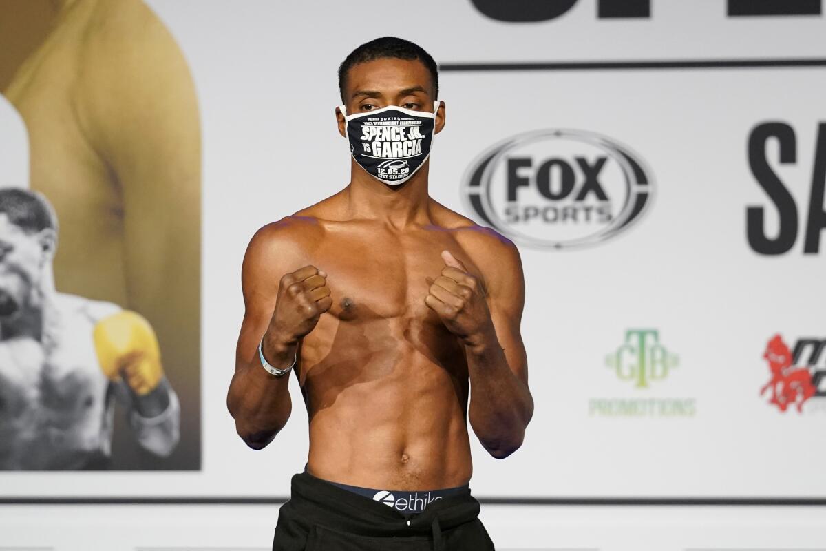 Errol Spence Jr. poses after his weigh-in Friday ahead of his welterweight title fight.