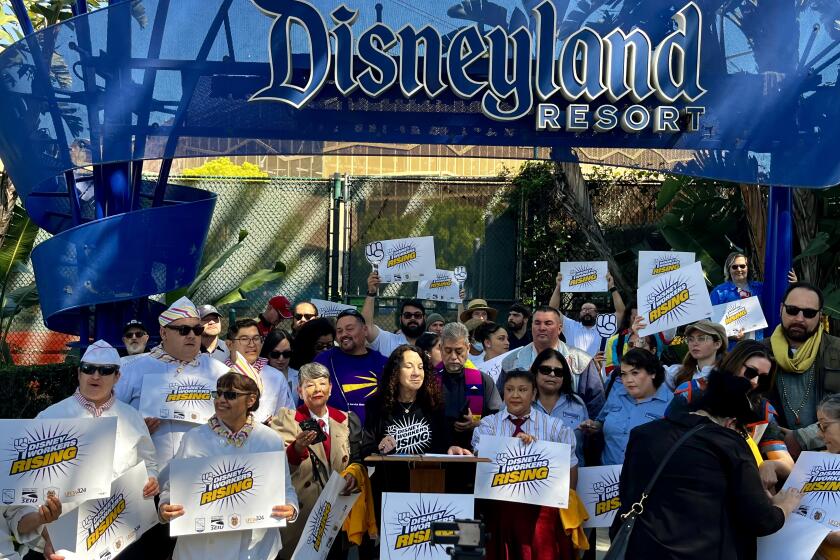 Andrea Zinder, president of UFCW Local 324, emcees a Disney workers press conference 