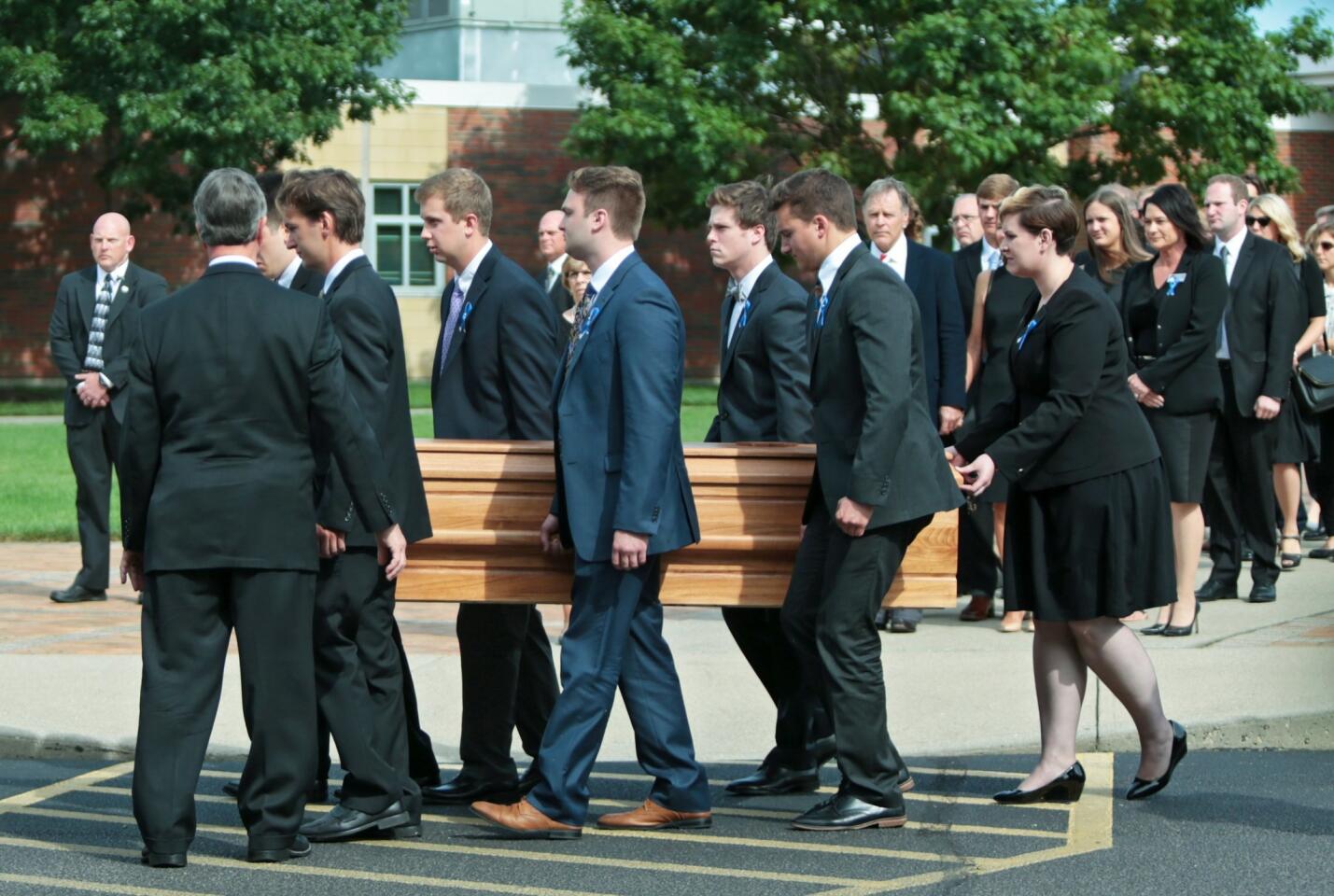 Pallbearers carry the coffin of Otto Warmbier during his funeral in Wyoming, Ohio.